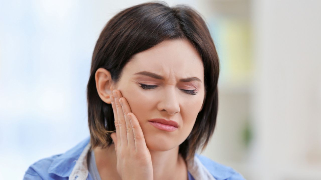 sintomas de abscesso dentário